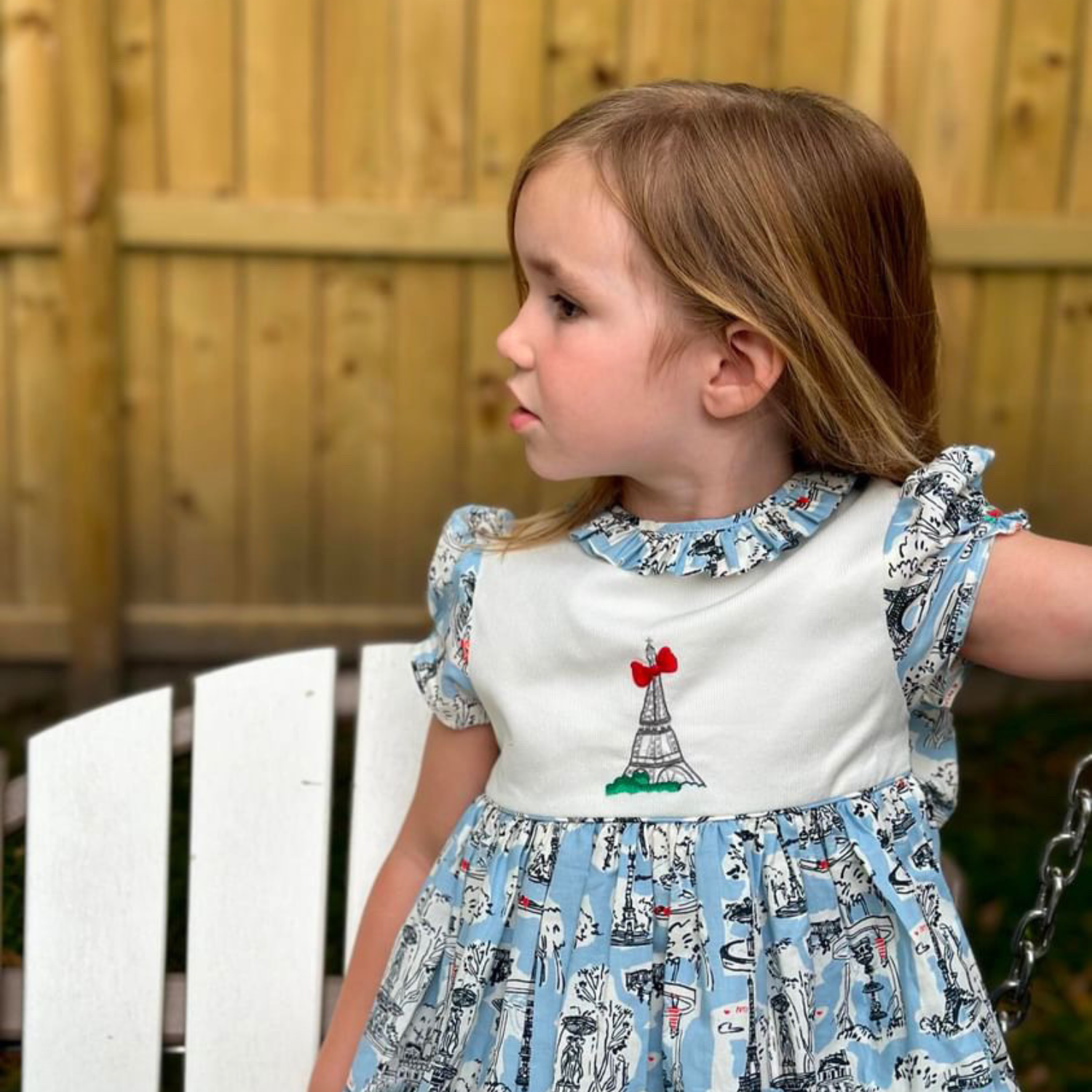 Charlotte sy Dimby classic timeless traditional smocked dresses for babies and girls handmade French style children clothing paris boutique twirling princess dress pastel blue and pink princess charlotte style