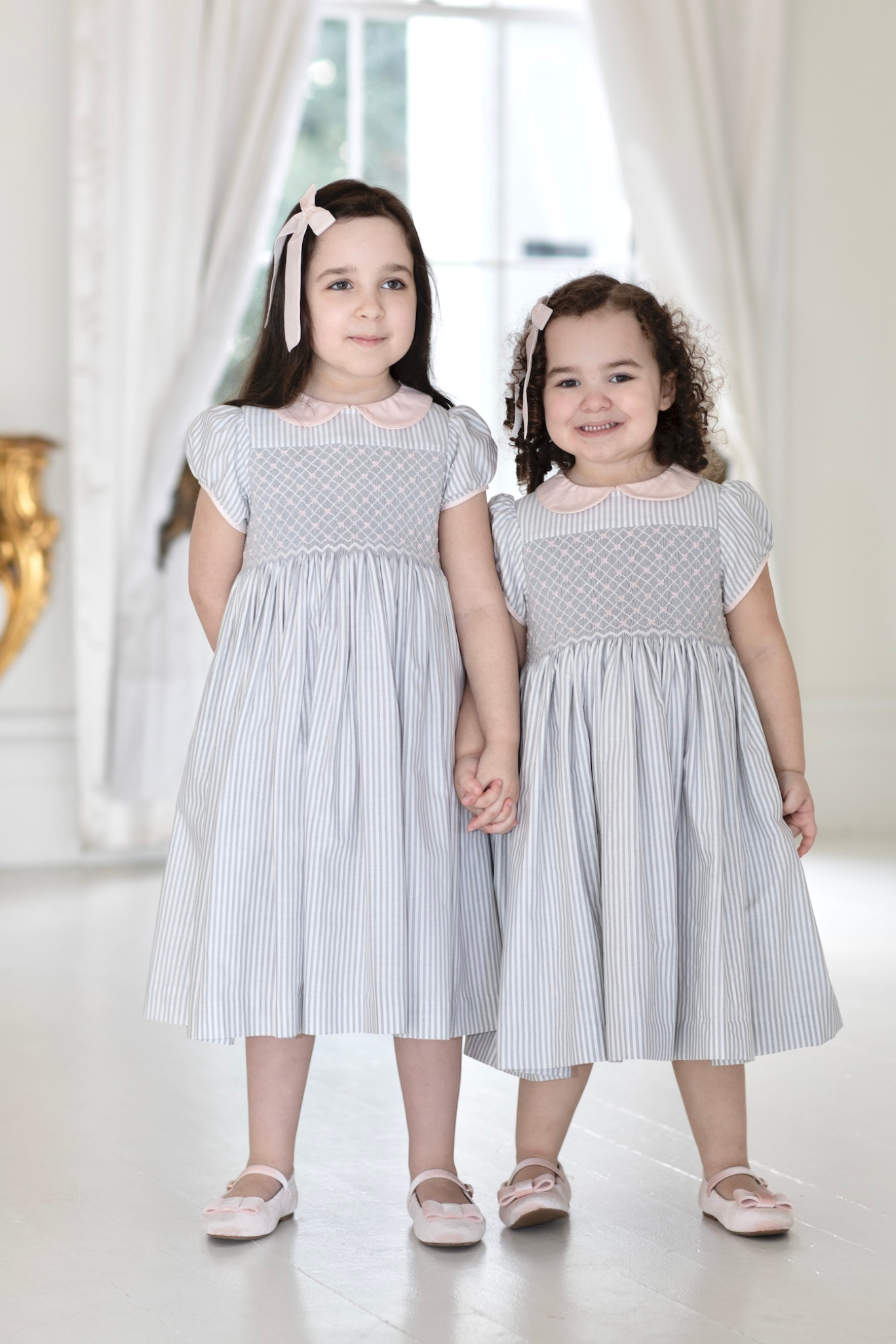 Charlotte sy Dimby classic timeless traditional smocked dresses for babies and girls handmade French style children clothing paris boutique grey and white striped peter pan collar matching sisters