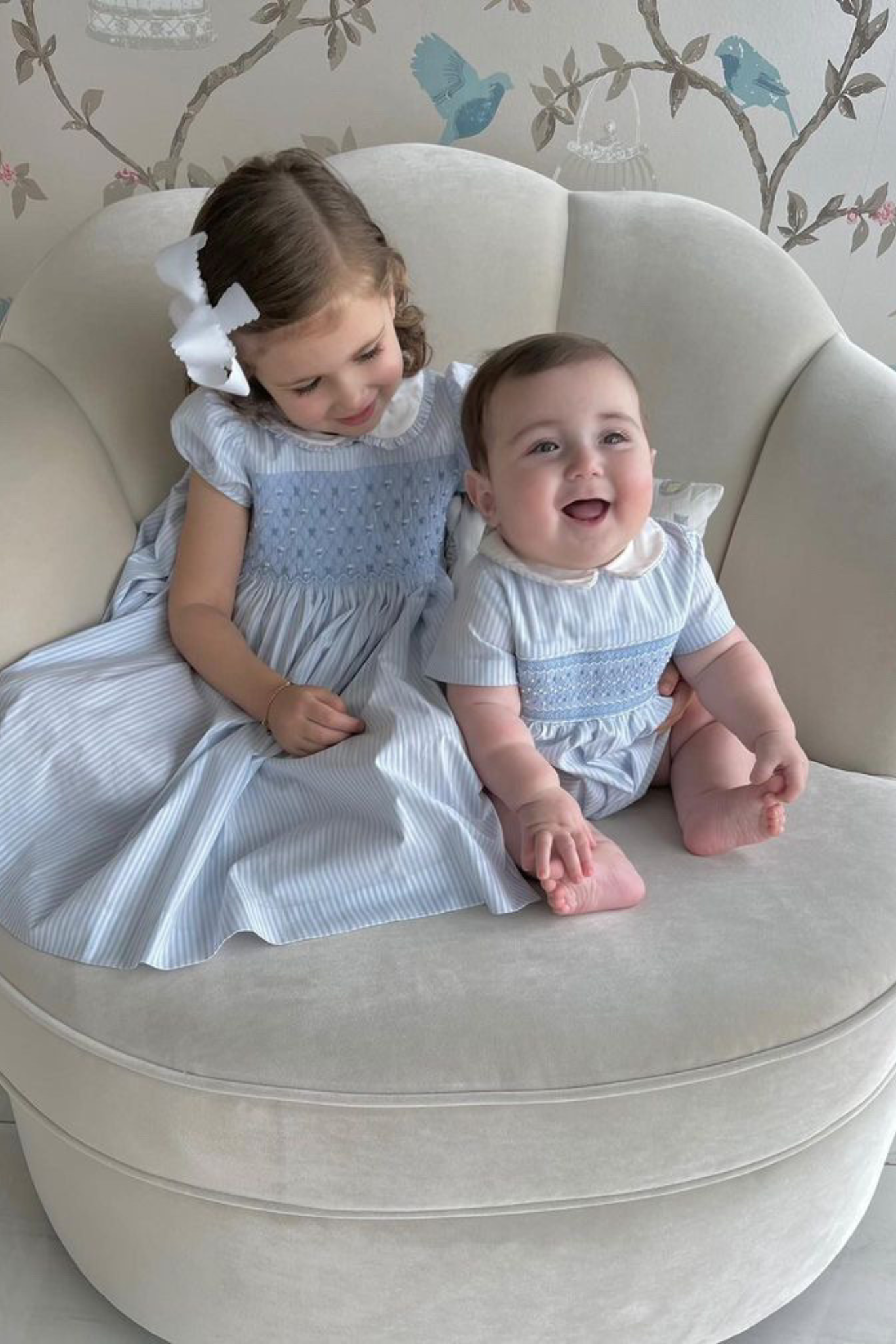 Charlotte sy Dimby classic timeless traditional smocked dresses for babies and girls handmade French style children clothing paris boutique matching pastel blue striped sibling outfits dress and bubble